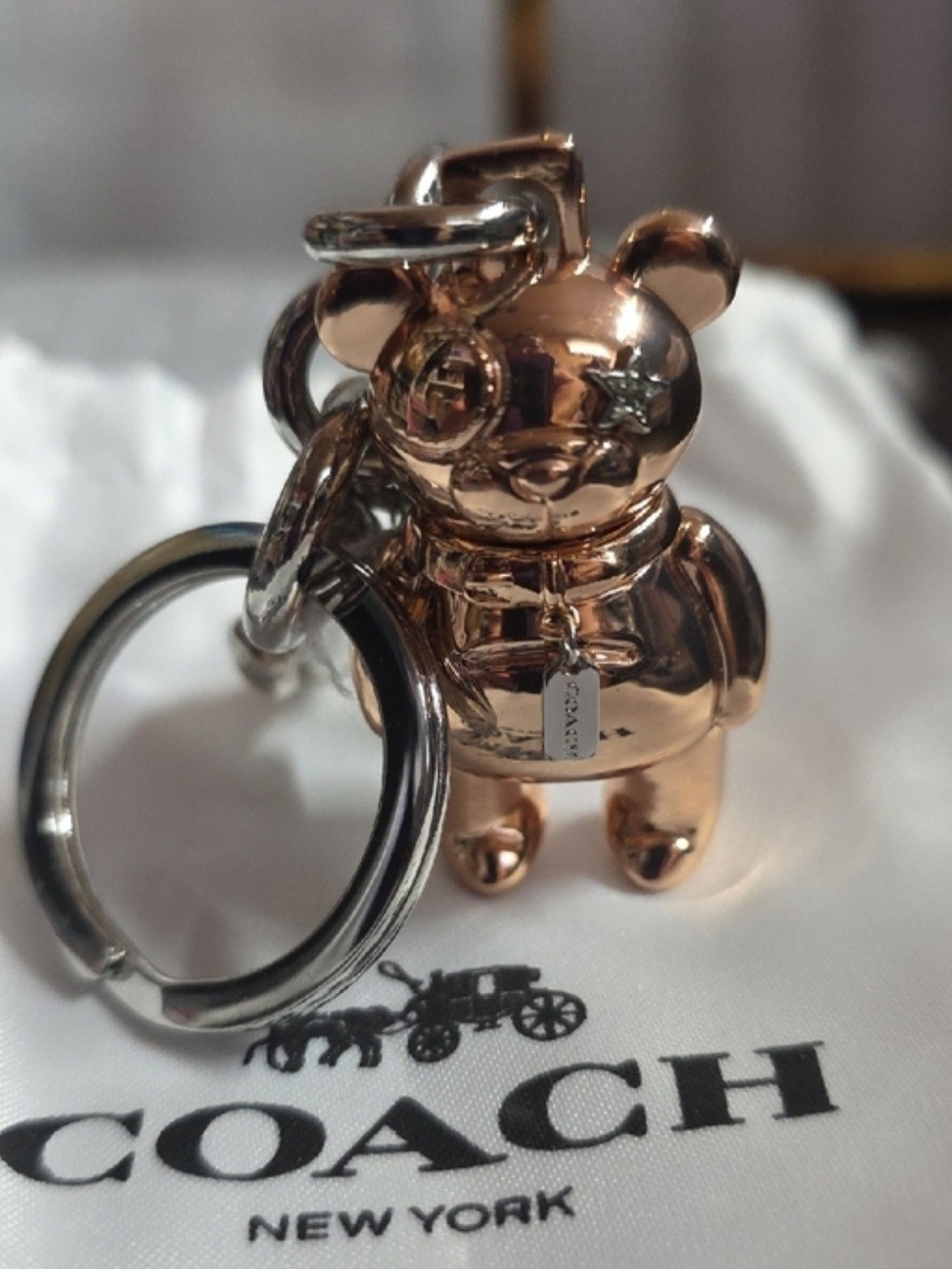 The official Rose Gold Coach 3D Mascot Bear Bag Charm & Keychain